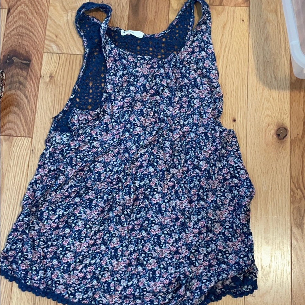 Blue floral romper with crochet back